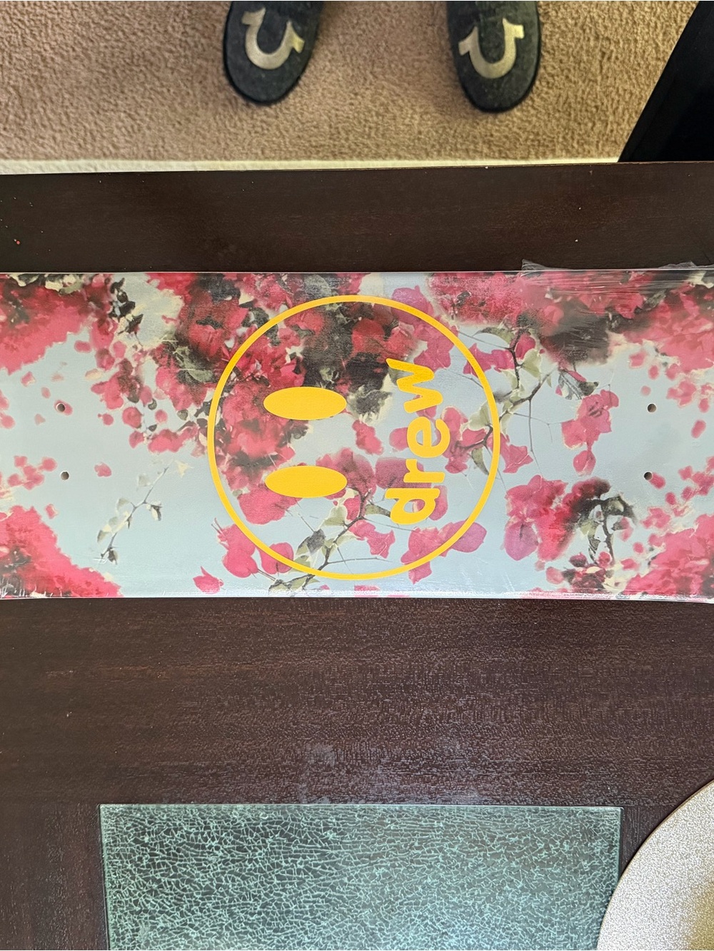DREW Floral Skate Deck with Yellow Logo on Pink Blossoms
